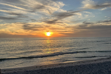 Sun setting over the Gulf from a Sarasota beach