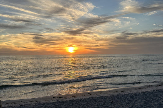 Sun setting over the Gulf from a Sarasota beach