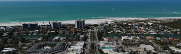 Aerial view of St. Armands Circle with Lido Key, Lido Beach and the Gulf of Mexico beyond