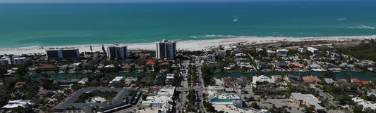 Aerial view of St. Armands Circle with Lido Key, Lido Beach and the Gulf of Mexico beyond