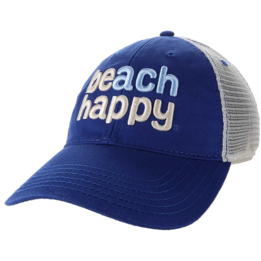A blue trucker-style baseball cap with a curved brim, featuring the words 'beach happy' embroidered on the front in light blue and cream. The back panels are made of light gray mesh.