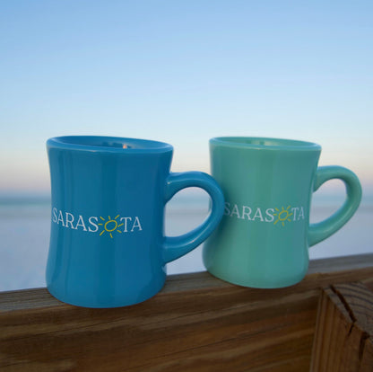 Sarasota coffee mugs with sun logo
